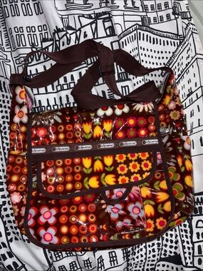 LeSportsac Brown Floral Vinyl Crossbody with Multicolor Flowers